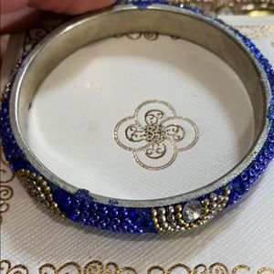 Blue white and gold beaded bracelet